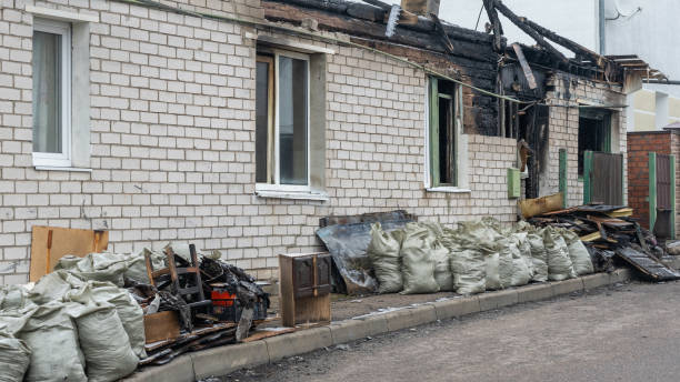 Professional Fire Damage Removal technician working in Luck, WI
